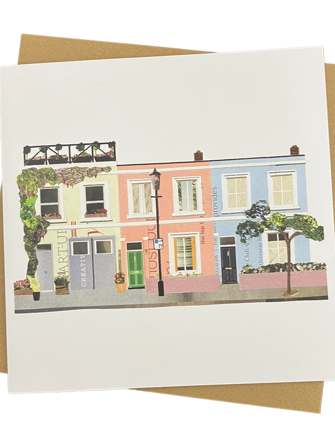 Greetings Card with a collaged illustration of Notting Hill with an envelope on a white background.