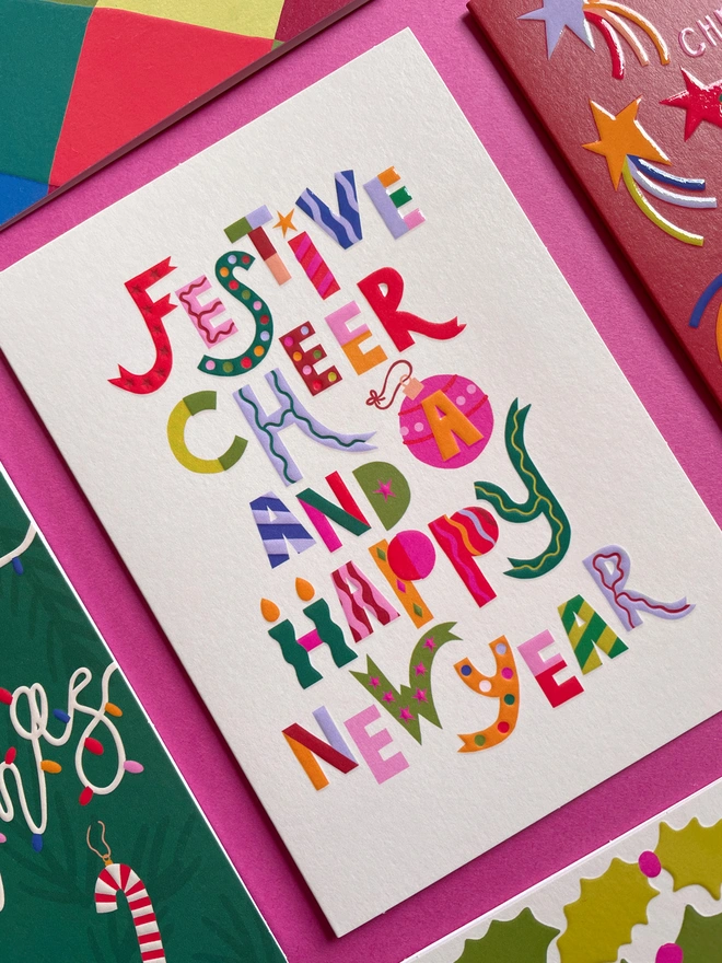 ‘Festive Cheer and a Happy New Year’ Colourful & Playful Type Luxury Christmas Card | Raspberry Blossom