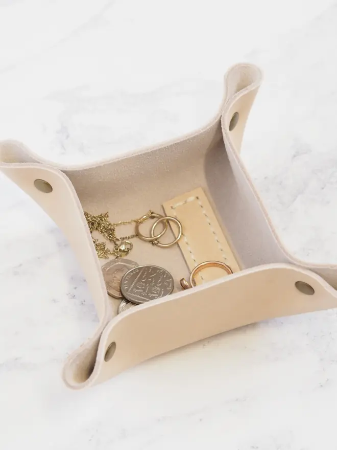 small leather coin tray with letter