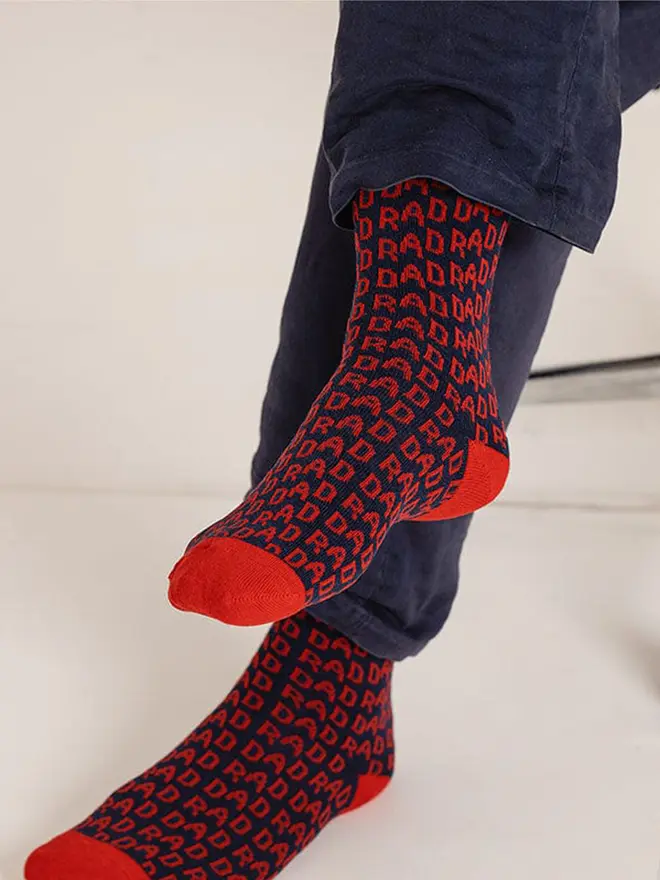 Navy Rad Dad socks with rad dad written in red 