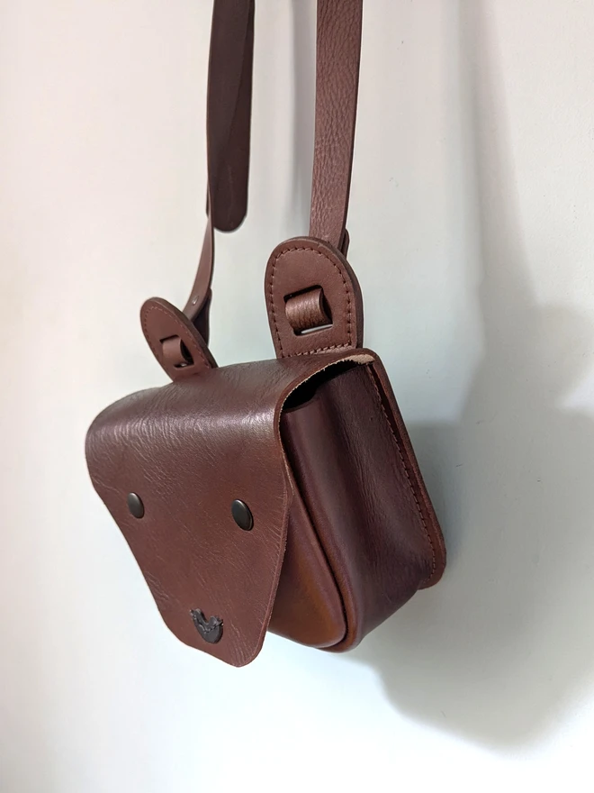 hangingnhandmade brown kids bear cross- body bag, side view
