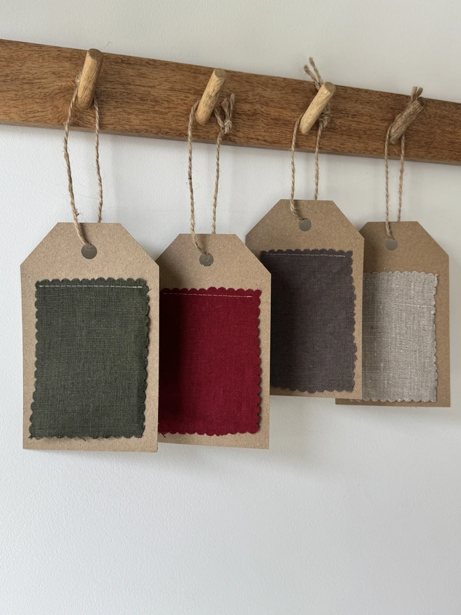 Striped Embroidered Christmas Stocking. A selection of plain and linens on a swatch
