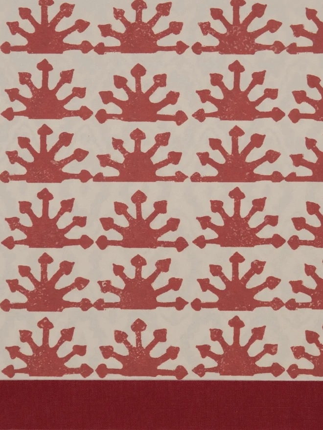 Retro Drum Lampshade. Close-up of a hand block printed lampshade showing a bold repeating geometric pattern. The colourful printed design and neat trim bring character and a handcrafted finish to any lamp.
