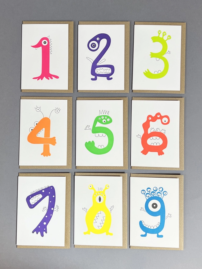 Neon Alien numeral cards one to nine for children's birthdays with envelopes