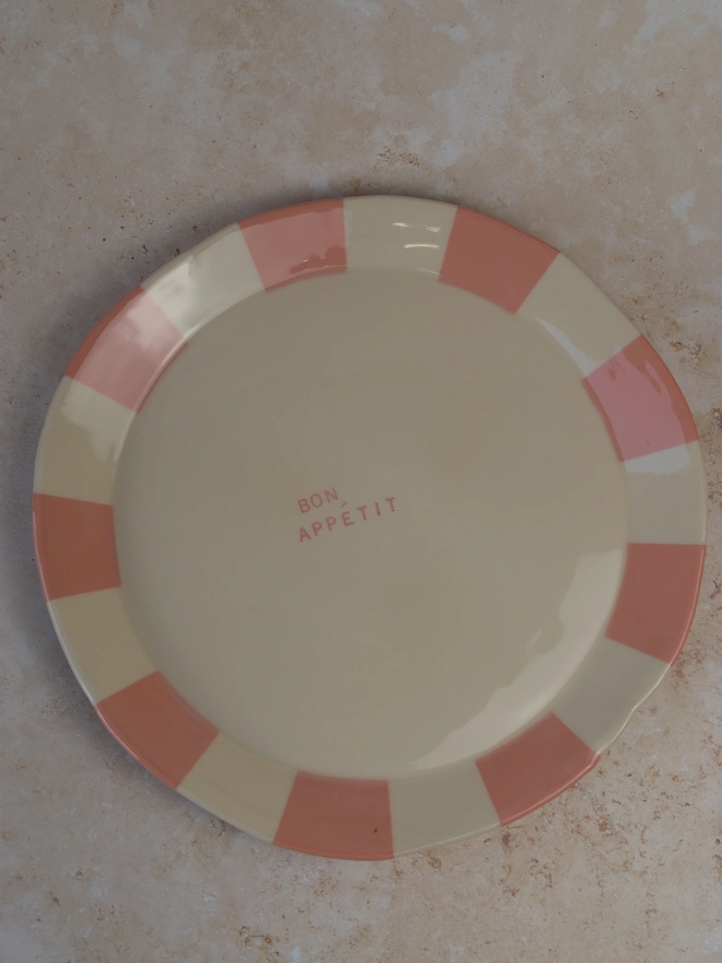 Peach striped ceramic Bon Appétit plate
