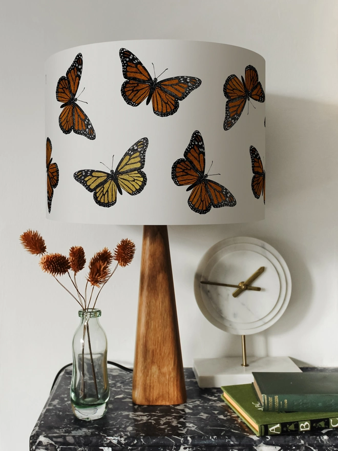 Mountain & Molehill monarch butterfly shade with gold detail on wood lamp base