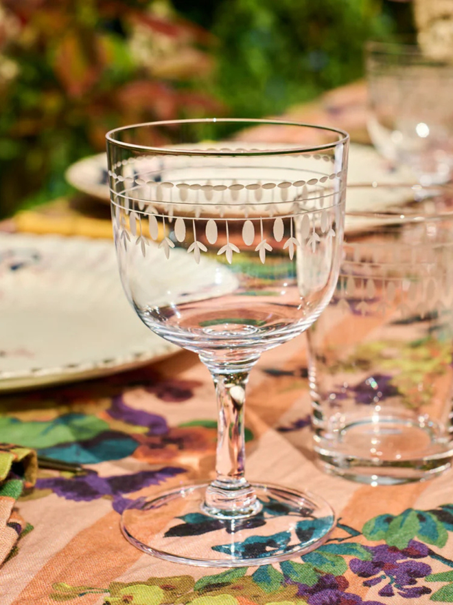 'daphne' engraved ovals wine glass. a wine glass patterned with oval detailing.