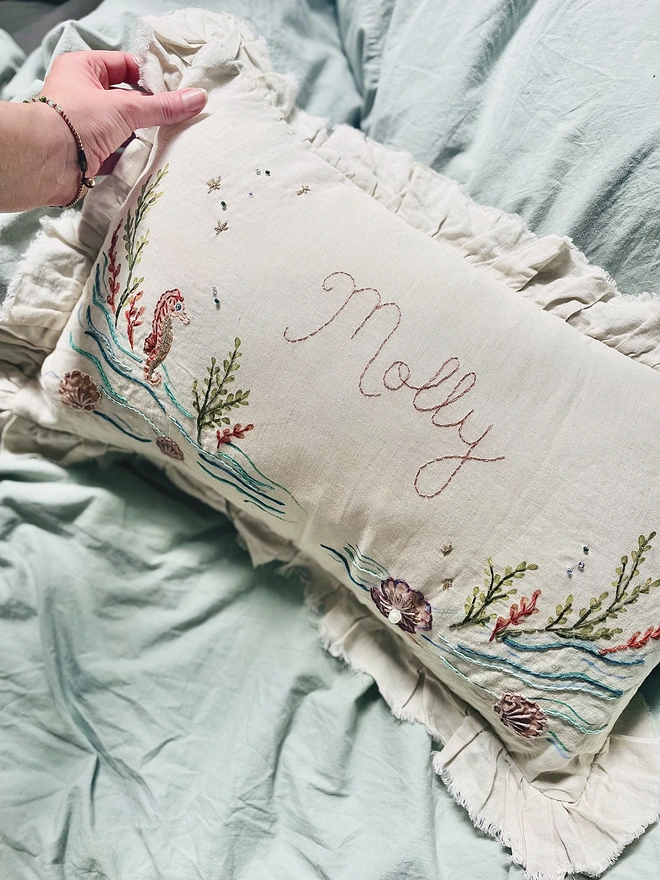 Under the sea, hand embroidered cushion on natural linen with personalised name 