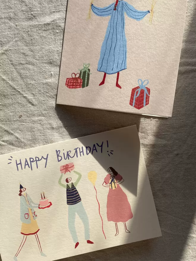 birthday cards with girl and balloons and presents on