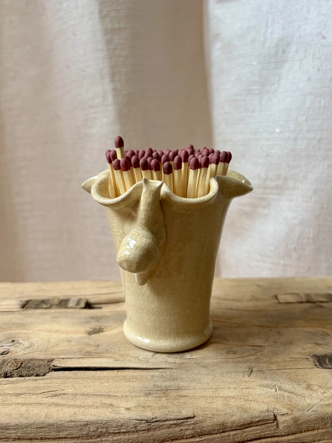 Ceramic match stick pot with hand sculpted snail