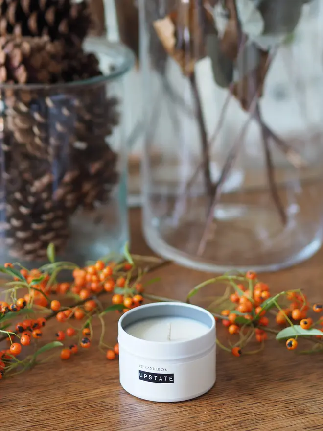 Small travel container candle