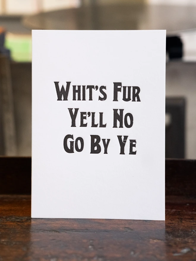 Letterpress card with text design "Whit's Fur Ye'll No Go By Ye"