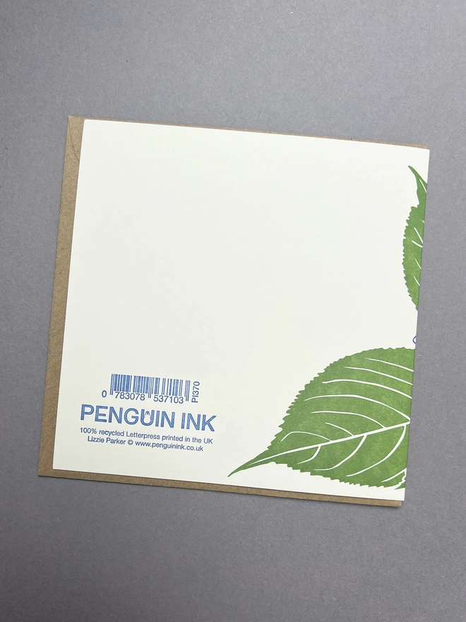 the back of letterpress printed card shows a wraparound design, barcode and Penguin Ink logo
