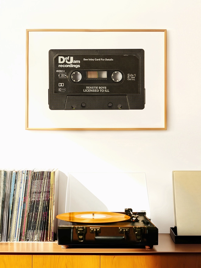 beastie boys license to iii cassette tape print. printed framed and hung on wall above record player and vinyl collection.