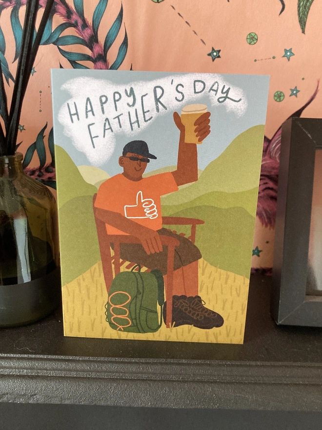 Hiking Father's Day card, on a fireplace mantlepeice