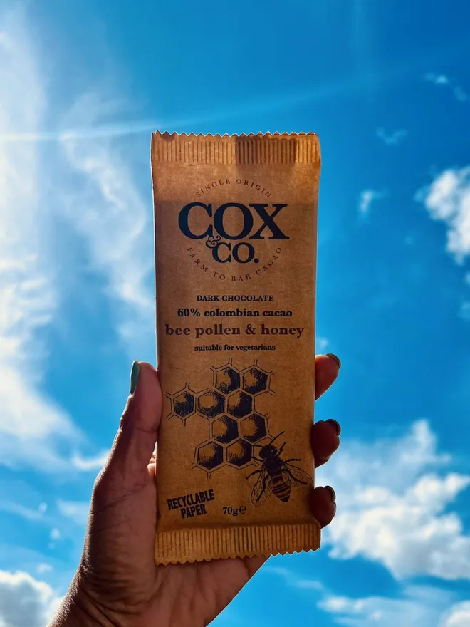 bee pollen chocolate bar with the sky as a background