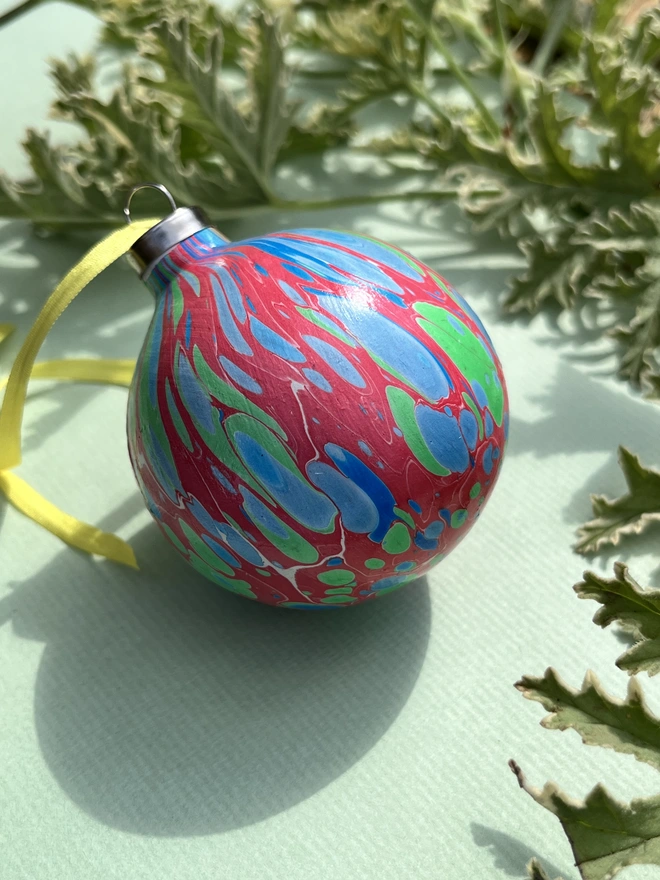 Hand-marbled round ceramic Christmas bauble