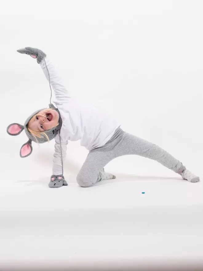 EKA Animal Bonnet seen on a child playing.