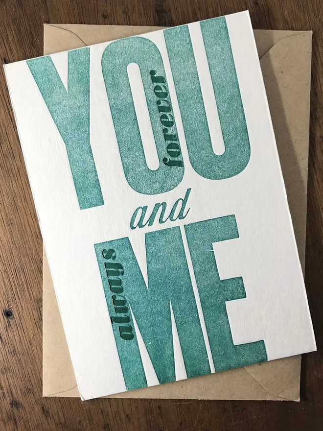 'You And Me Always And Forever' Love Card, green card placed on a brown envelope. 