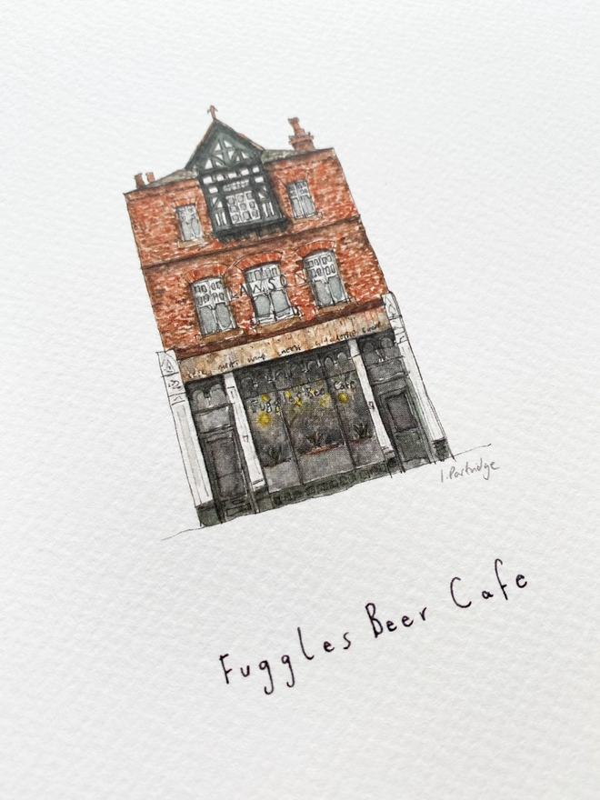 Beautiful watercolour illustration of Fuggles in Tonbridge.  A brick building with a dark framed shopfront that has a large window and wooden fascia sign above with ‘Fuggles Beef Cafe’ written in black lettering.The watercolour style is painted with a black pen outline and organic loose style with small details. A photo taken at an angle showing some of the detail. 