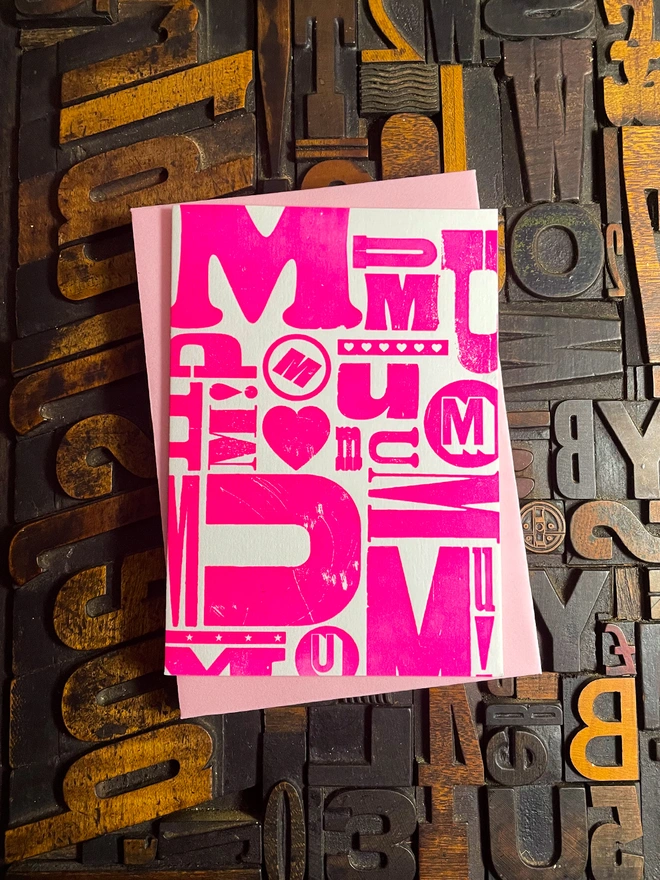A deep impression letterpress printed mother's day card. Fluorescent pink ink on traditional printed type blocks. Printed by hand on my 1915 Arab Crown Folio Press. Comes with a range of matching coloured envelopes.