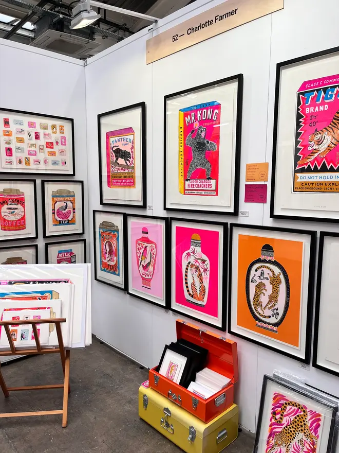 Sunbirds Snuff Bottle Screenprint Sunny Sunbirds, an image of a collection of colourful prints in a gallery hung against a white wall. 