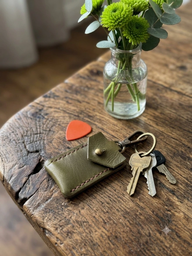 handmade olive green leather plectrum holder keyring