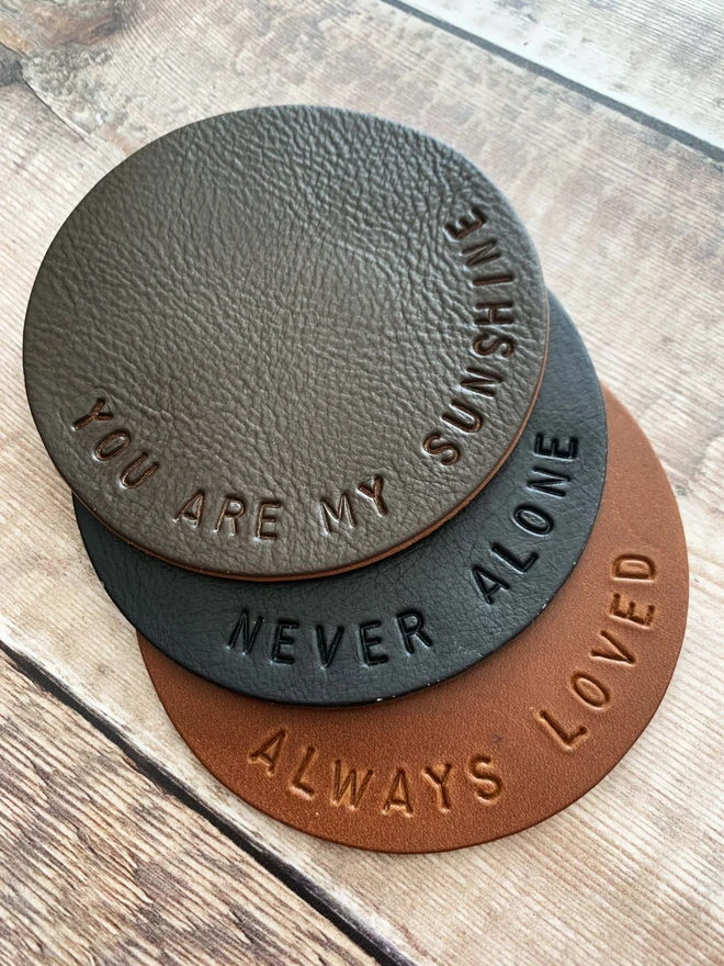 Brown and black leather coasters