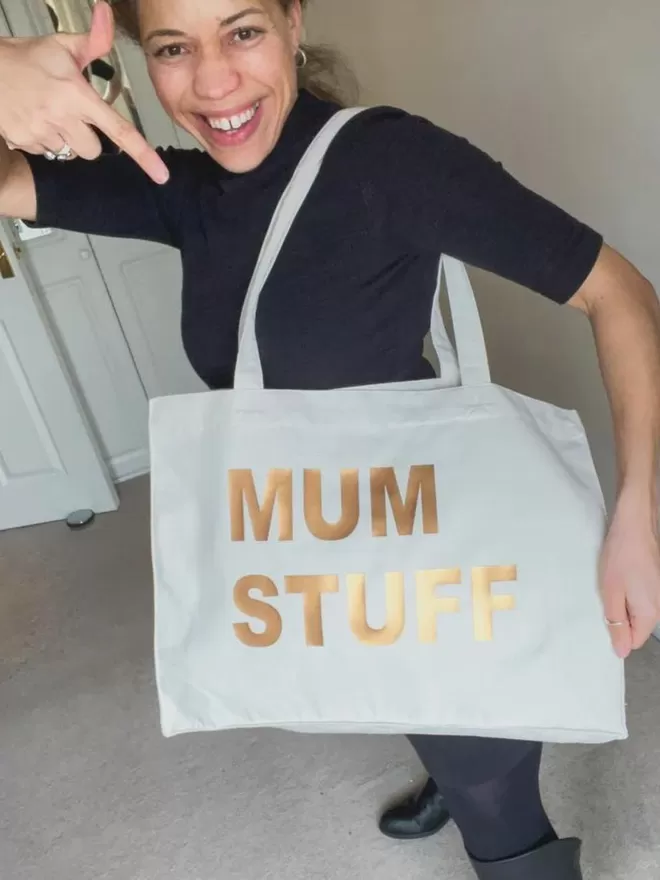 White mum stuff bag with gold lettering