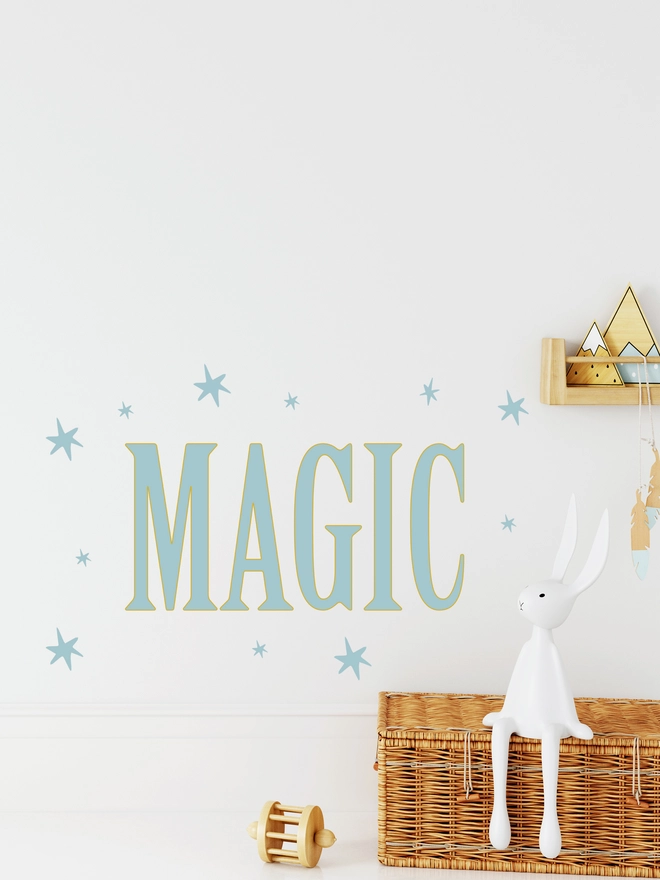 Magic wording wall sticker with stars around wording in a styled kids bedroom