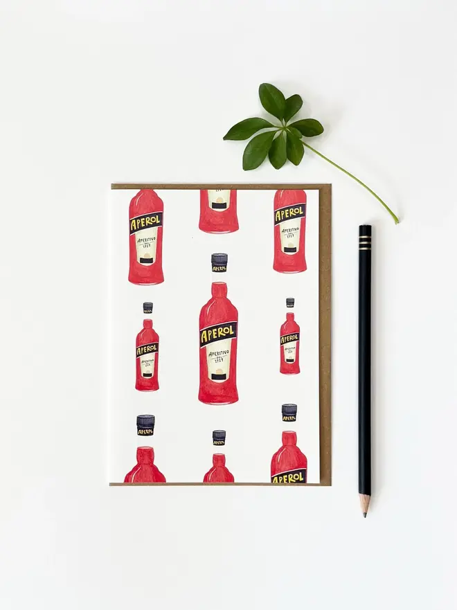 aperol spritz bottle illustrated card. card photographed on white background.