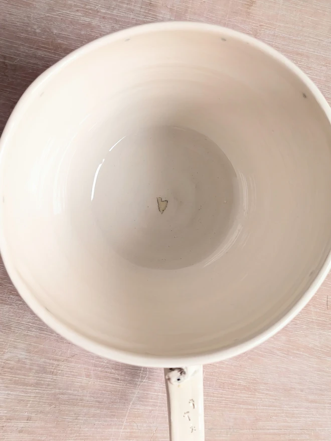 shot of the inside of a cup with heart 