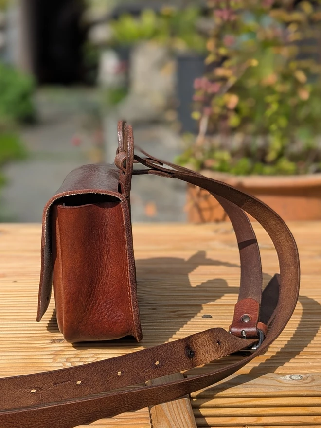 handmade brown kids bear cross- body bag, side view