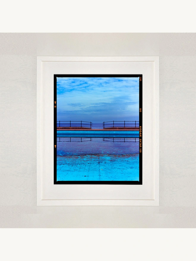 Craig y Don Pool framed in white