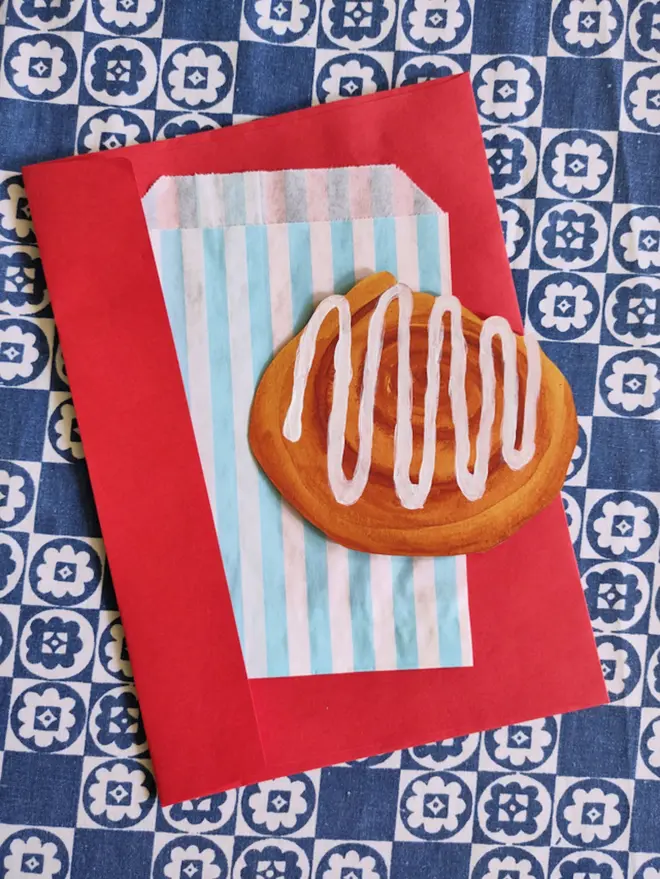 hand painted cinnamon roll cut out on striped paper