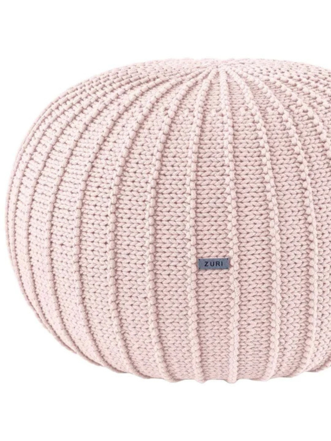 Zuri House. Large pale pink knitted pouffe.