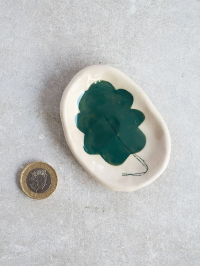 Wee Dishes. A dish with a leaf design.
