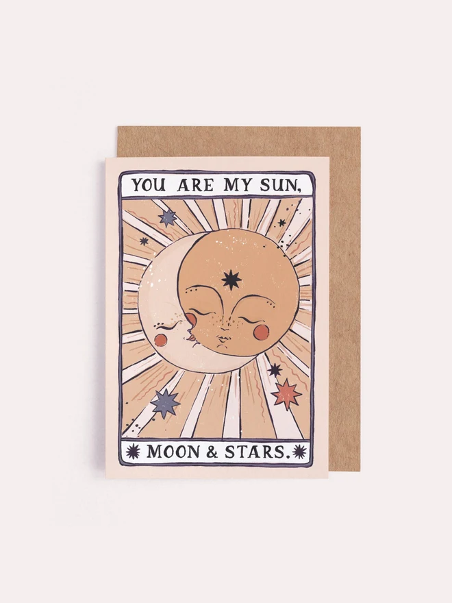 Sun, Moon & Stars Card shown with its kraft envelope