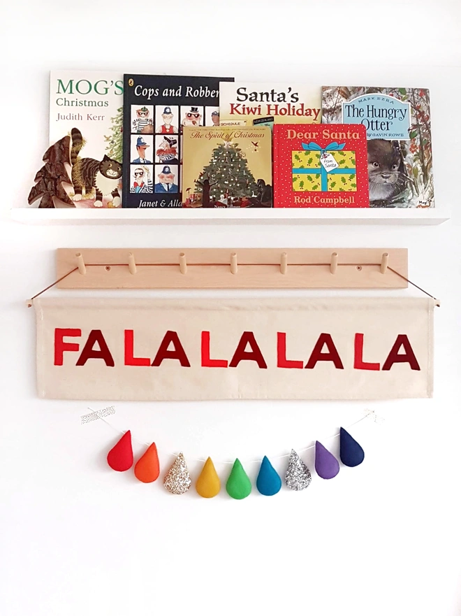 Handmade “Fa La La La La” Christmas banner in festive felt colours. Perfect wall hanging for adding cheer above your fireplace, tree or hallway.