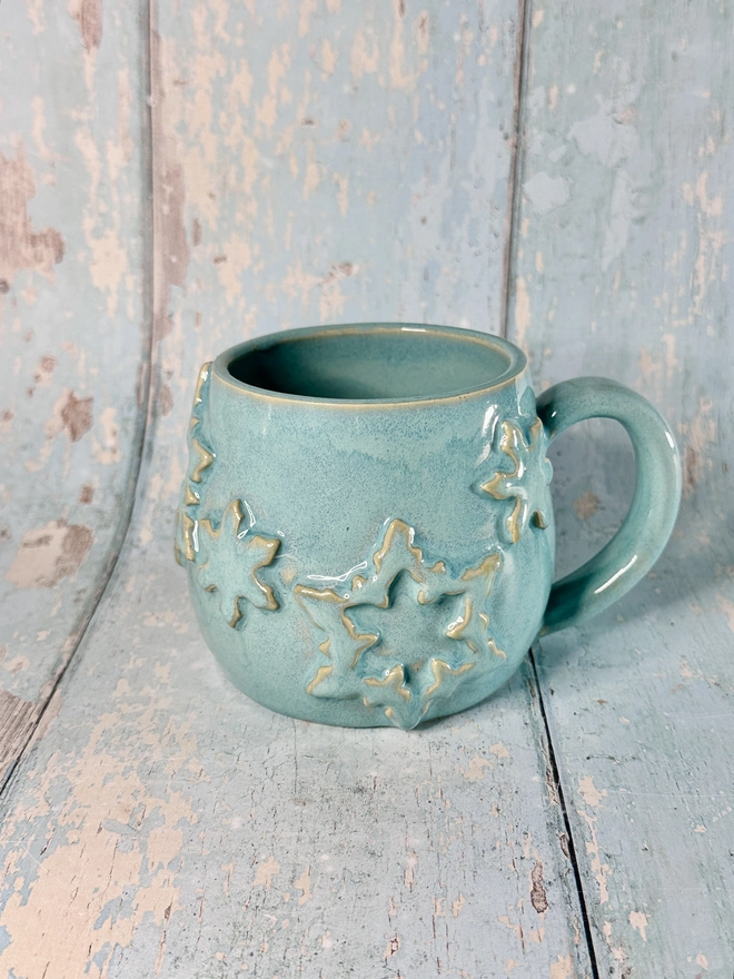Festive Turquoise Snowflake Ceramic Mug
