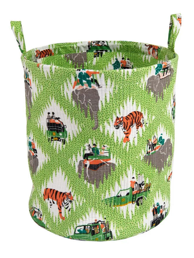 Tiger Safari Quilted Storage Basket, a green animal print safari basket sitting against a white backdrop.