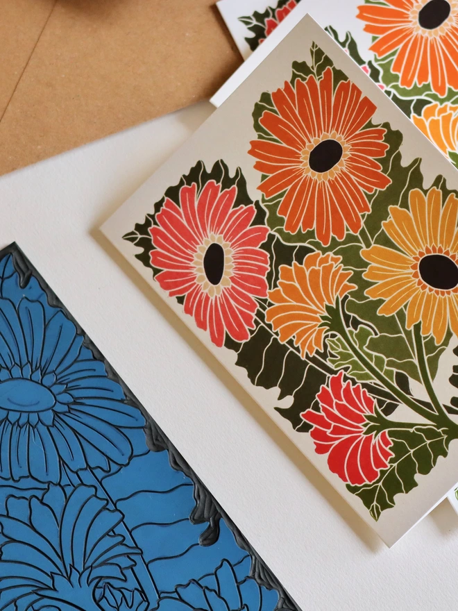 Joy Bloom Gerbera Daisy notecard set with recycled kraft envelopes. Eight A6 hand-carved botanical greeting cards and matching envelopes, eco-friendly stationery perfect for thank you notes and correspondence. British flora design.