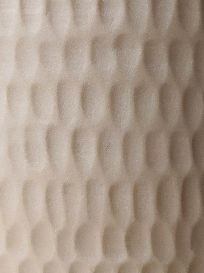 Pale Oat Neutral Porcelain Hand Carved Scalloped Texture.