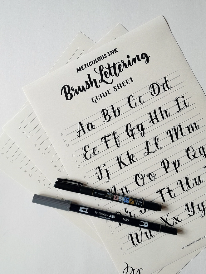 Meticulous Ink Brush Lettering Kit - Close up of alphabet with 2 pens