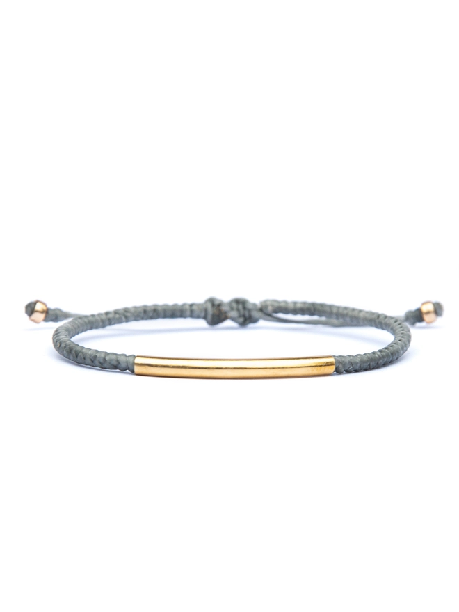 grey rope and gold bracelet