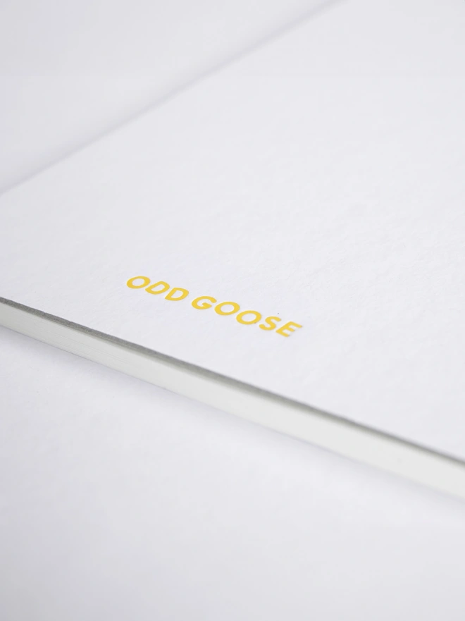 Odd Goose Dream Recorder Creative Notepad close up of yellow foil printed logo on back