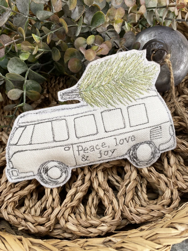 camper van christmas decoration in basket