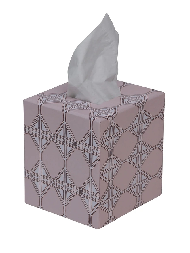 Tijan Tissue Box Cover, a colourful and patterned tissue box sitting on a white surface against a plain backdrop. 