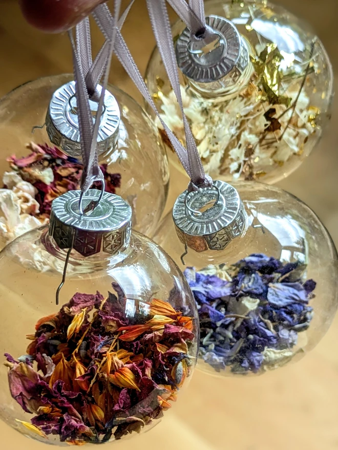 flower petal filled glass baubles