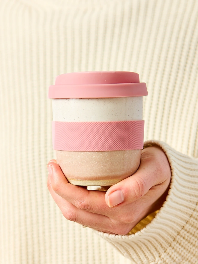 pink ceramic travel mug
